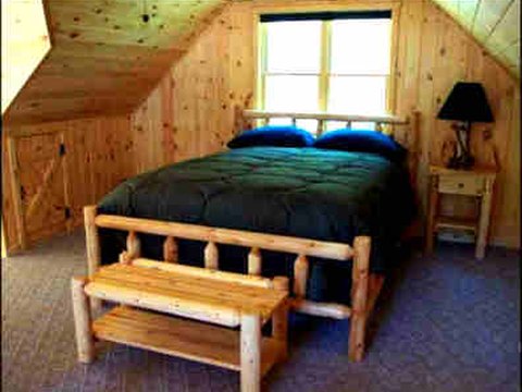 Log bed in a loft bedroom
